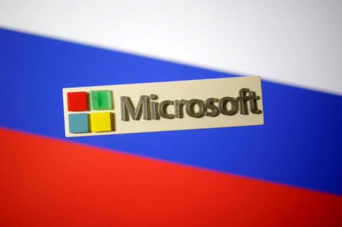 A 3D-printed Microsoft logo is seen on a displayed Russian flag in this illustration taken January 12, 2018. Picture taken January 12, 2018. Microsoft thwarted attacked against congressional candidates