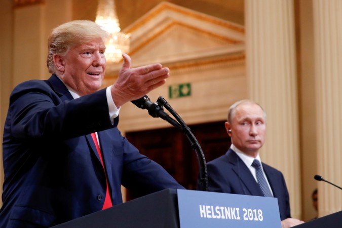 FILE PHOTO: US President Donald Trump gestures during a joint news conference with Russia's President Vladimir Putin after their meeting in Helsinki, Finland, July 16, 2018. Trump Putin