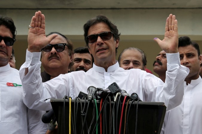 Cricket star-turned-politician Imran Khan, chairman of Pakistan Tehreek-e-Insaf (PTI) Imran Khan speaks to media