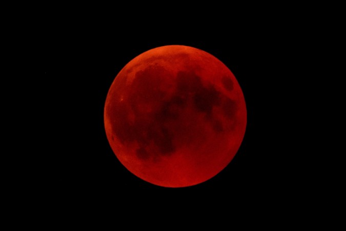 A Blood Moon rises above The Hohenzollern Castle, the ancestral seat of the Prussian Royal House and of the Hohenzollern Princes, situated at the periphery of the Swabian Alb on July 27, 2018 in Hechingen, Germany. The period of totality during this eclipse, when Earth's shadow is directly across the moon and it is at its reddest, will last 1 hour, 42 minutes and 57 seconds, making it the longest viewable lunar eclipse this century. Matthias Hangst/Getty Images blood moon july 27