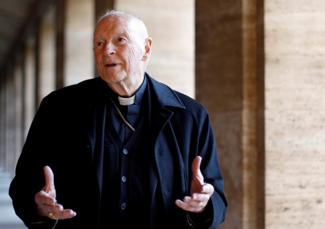 FILE PHOTO: Cardinal Theodore Edgar McCarrick smiles during an interview with Reuters at the North American College at the Vatican February 14, 2013. Cardinal Theodore Edgar McCarrick