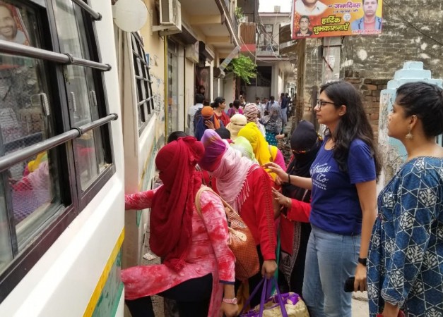 Delhi Commission for Women (DCW) Chief Swati Maliwal with the girls who were rescued from Hotel Hriday Inn in Delhi's Paharganj area on Tuesday night; in New Delhi on Aug 1, 2018. The Delhi Commission for Women (DCW) on Wednesday said that it rescued 39 Nepali women, who had become victims of human trafficking. DCW rescues Nepali women in Central Delhi