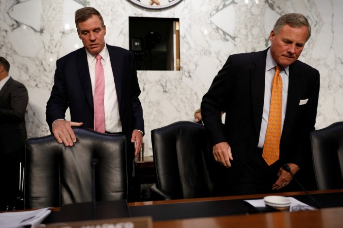 Sen. Richard Burr (R-NC), at right, and Sen. Mark Warner (D-VA), arrive for a hearing of the Senate Intelligence Committee on Capitol Hill in Washington, U.S., July 25, 2018. Senate Intelligence Committee