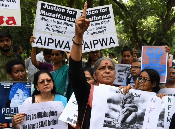 Indian activists hold placards as they take part in a protest over the sexual assault of girls at a state-run home in eastern India city, near Bihar Bhawan in New Delhi on July 30, 2018. Activists protest against the Muzaffarpur shelter home protest in Delhi