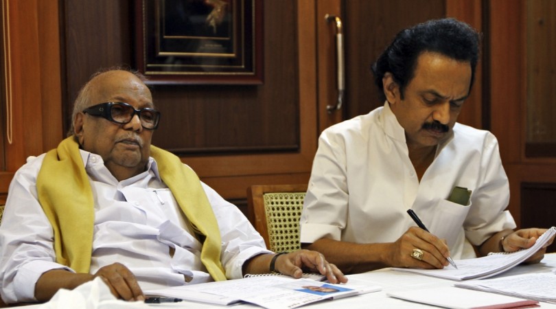 M. Karunanidhi (L) Chief Minister of the southern Indian state of Tamil Nadu and leader of Dravida Munnetra Kazhagam (DMK) party attends a meeting besides his son M.K. Stalin, a DMK leader and deputy Chief Minister of Tamil Nadu state, at party headquarters in Chennai March 8, 2011. India's Congress party and a key ally appeared closer to a deal on Tuesday to keep the ruling coalition with a parliamentary majority after threats to quit the government sparked worries of instability in Asia's third-largest economy. Karunanidhi and MK Stalin