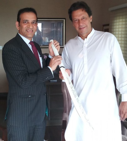 Indian HC Ajay Bisaria gifted a cricket bat autographed by the entire Indian cricket team to PTI chairman and prime minister-elect Imran Khan in a meeting discussing prospects of India-Pak relationship. Imran Khan with India's envoy to Pakistan Ajay Bisaria