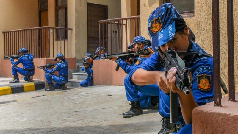 Members of the all-women SWAT team of the Delhi Police during a training routine. All-women SWAT team.