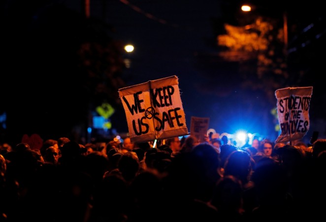 Rrotesters ahead of the one year anniversary of Charlottesville charlottesville incident