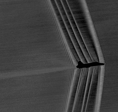Shockwaves produced by a U.S. Air Force Test Pilot School T-38C banking at Mach 1.05 Shock waves