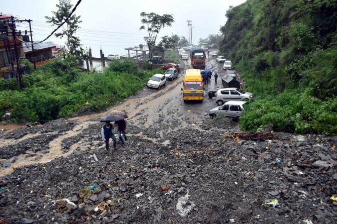 Massive landslide at National Highway near Bhattakufer due to heavy rains, in Shimla, on Aug 13, 2018. Shimla landslide Himachal rains