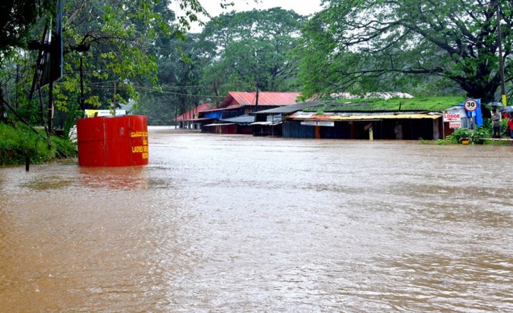 Kumaradhara: A view of the flooded Kumaradhara near Subrahmanya in Dakshina Kannada district got submerged following incessant rains; in Karnataka on Aug 14, 2018. Torrential rains up to 30 cm lashed Karnataka's coastal and south interior districts, causing landslides and disrupting normal life. Flood like situation at Kukke Subramanya temple in Karnataka
