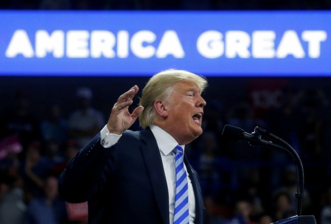 U.S. President Donald Trump speaks at a Make America Great Again rally at the Civic Center in Charleston, West Virginia, U.S., August 21, 2018 donald trump