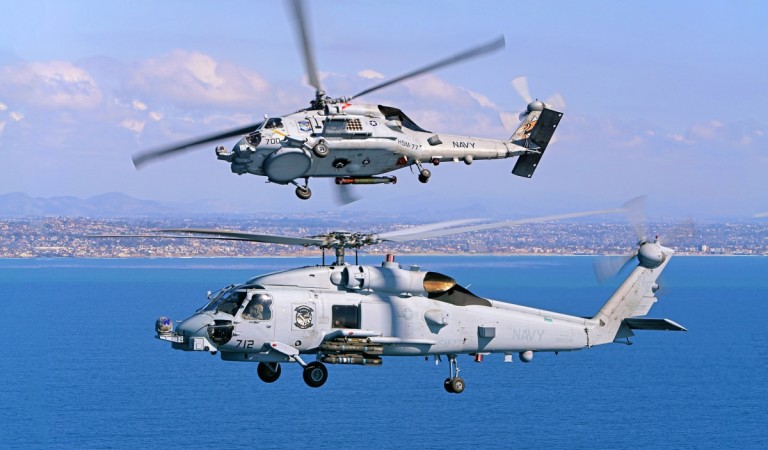 US Navy Sikorsky MH-60R Seahawk helicopters. The MH-60 Seahawk is the frontrunner to bag the Indian Navy contract for NMRH helicopters. US Sikorsky MH-60R SEAHAWK