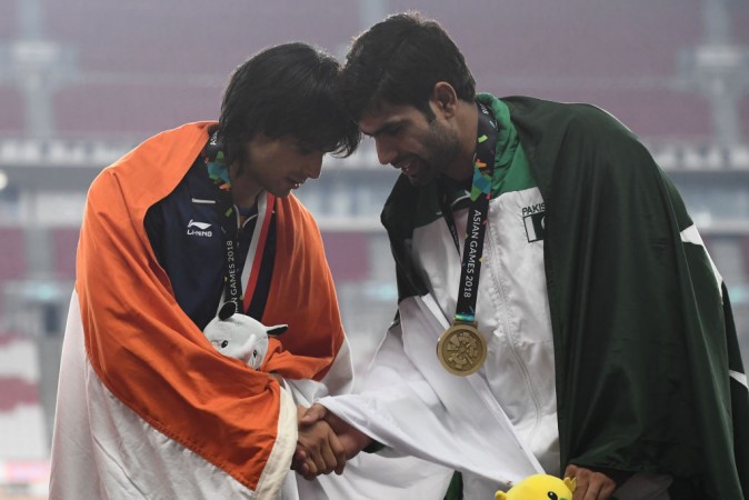 Neeraj Chopra of India and Arshad Nadeem of Pakistan during Asian Games 2018 medal ceremony. Neeraj Chopra Arshad Nadeem