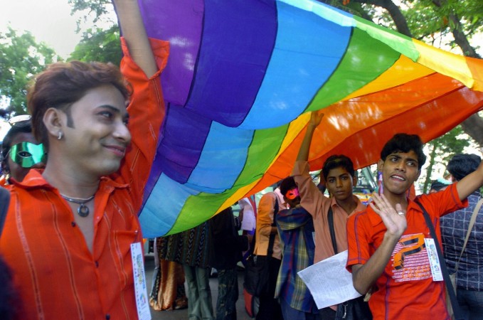 Indian members of the Integration Society, an organization committed to the defence of human rights and sexual freedom carry a rainbow banner as they take part in a march entitled 'Walk on the Rainbow' in Kolkata, 26 June 2005 to commemorate the anniversary of the 1969 Stonewall riots in New York, said to be the birth of the Gay Liberation Movement. Some hundred members took part in the march even as homosexuality in India stands criminalized because of a mid 19th century colonial law, as the section 377 of the Indian Penal Code enacted by the British in 1860 criminalizes what it calls, 'sexual offences against the order of nature' section 377