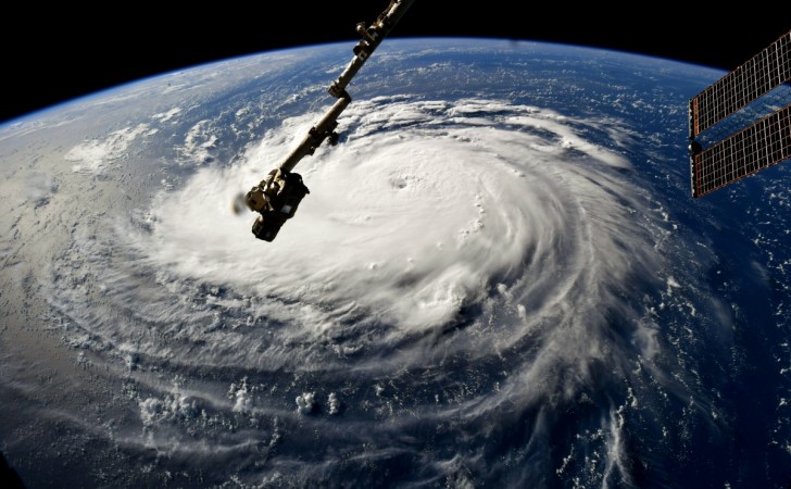 In this NASA handout image taken by Astronaut Ricky Arnold, Hurricane Florence gains strength in the Atlantic Ocean as it moves west, seen from the International Space Station on September 10, 2018. Weather predictions say the storm will likely hit the U.S. East Coast as early as Thursday, September 13 bringing massive winds and rain Hurricane Florence