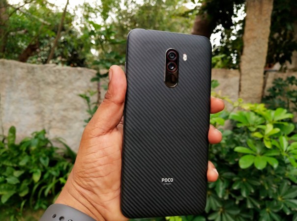 Poco F1 comes with dual-camera and fingerprint sensor on the back. the shell consists DuPont-made Kevlar coating, which used in making bullet-proof jackets Xiaomi, Poco F1, launch, review, price, specifications,