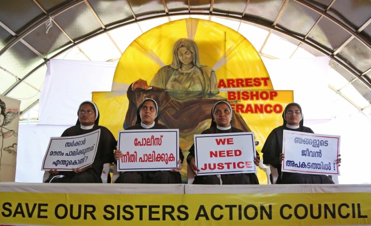 Nuns hold placards during a protest demanding justice after an alleged sexual assault of a nun by a bishop in Kochi, in the southern state of Kerala, India, September 13, 2018. The placards read in Malayalam Kerala nun rape