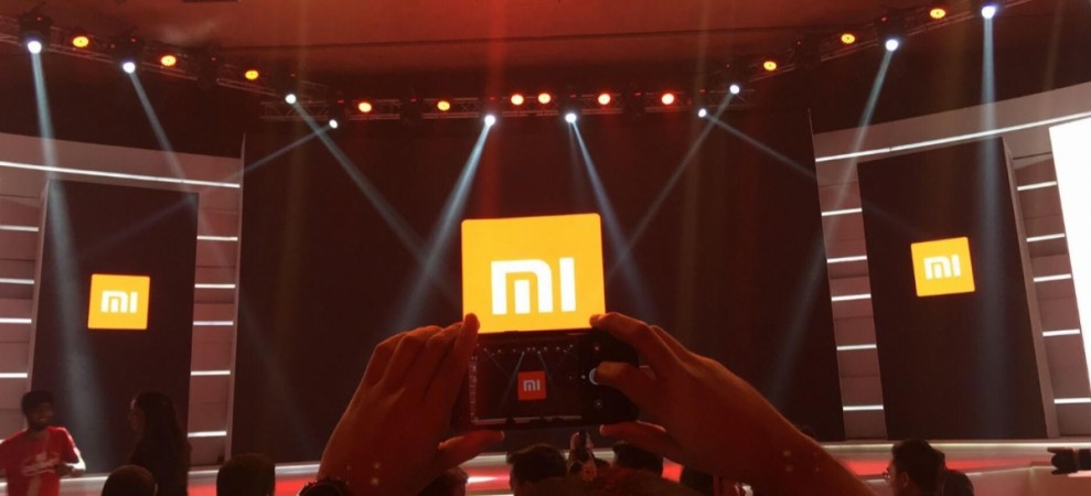 Xiaomi logo displayed on the screen ahead of the product showcase event in New Delhi. Xiaomi logo, representational image