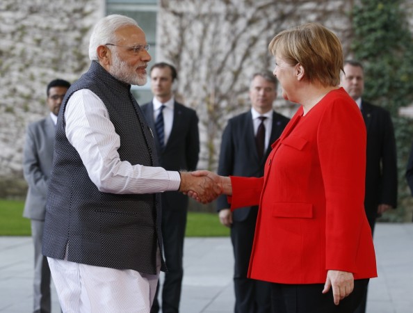 German Chancellor Merkel shakes hands with Indian Prime Minister Modi during their meeting in Berlin India and Germany