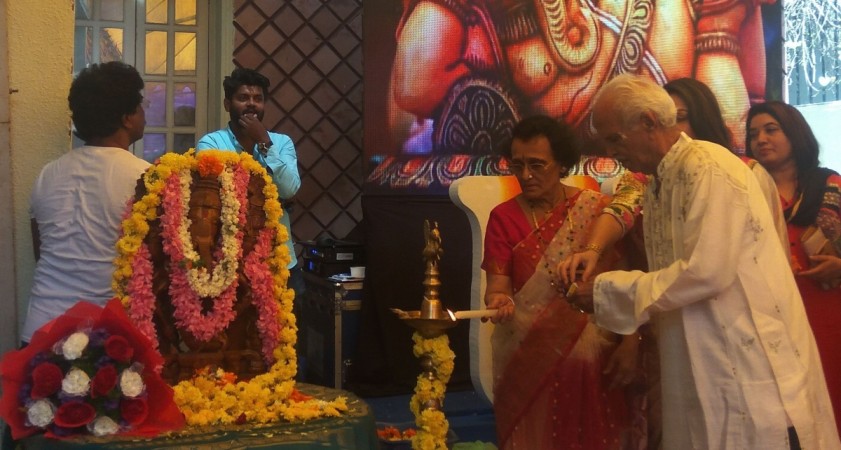 Upendra's parents lighting the lamp at the launch of his new party, Uttama Prajaakeeya Party. Upendra's 50th Birthday