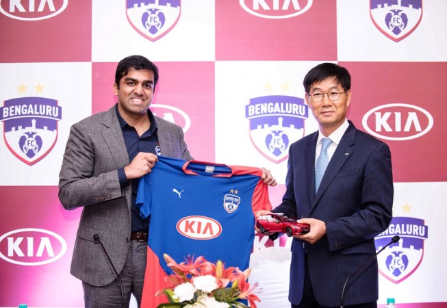 From left - Parth Jindal, CEO of Bengaluru FC and Kookhyun Shim, MD and CEO of Kia Motors India unveiling the new BFC class= Kia motors, Bengaluru FC