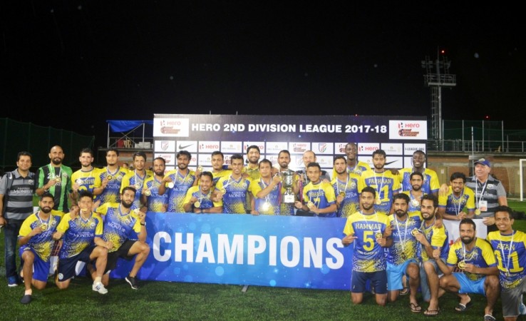 Real Kashmir FC players celebrate after they won the 2017-18 2nd Division League Real Kashmir FC