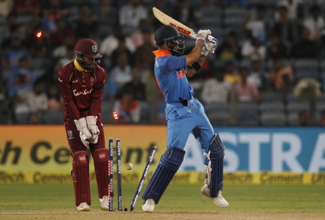 Virat Kohli fell to part-timer Marlon Samuels after reaching his third straight ton in Pune. Virat Kohli