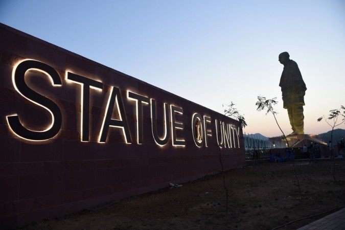 The 'Statue Of Unity', the world's tallest statue dedicated to Indian independence leader Sardar Vallabhbhai Patel, stands overlooking the Sardar Sarovar Dam near Vadodara in India's western Gujarat state on October 30, 2018 Statue of Unity
