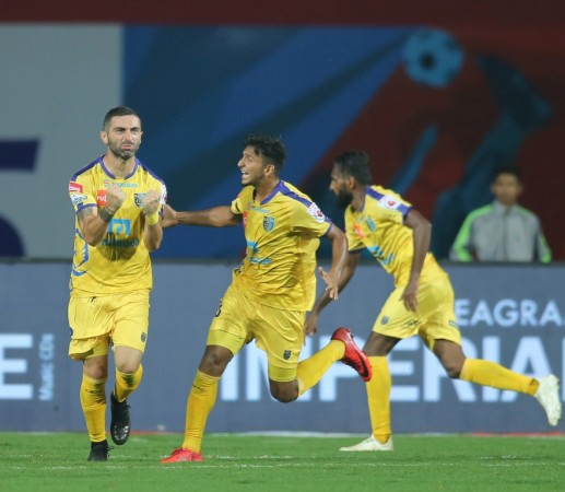 Kerala Blasters FC players celebrate after a goal against Jamshedpur FC Kerala Blasters FC