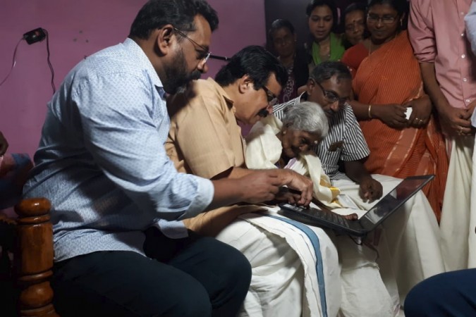 Karthyani Amma was presented with a laptop by state's education minister Professor C Raveendranath on Diwali Karthyani Amma was presented with a laptop by state's education minister Professor C Raveendranath on Diwali
