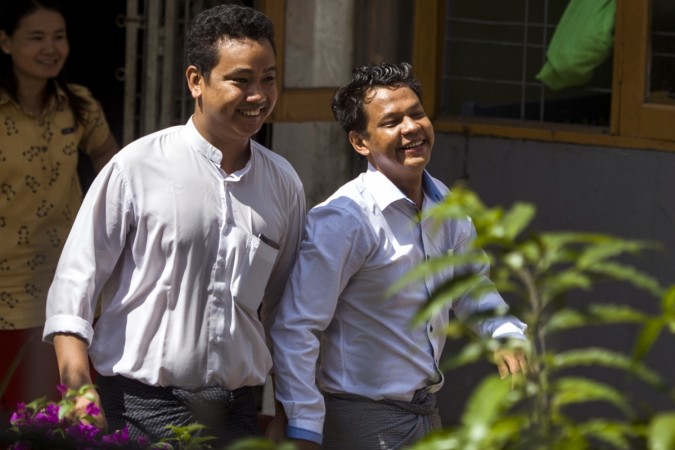 Detained Myanmar journalist Phyo Wai Win (R) leaves the court compound after a hearing in Yangon on October 26, 2018. - Three Myanmar journalists from Eleven Media were granted bail on October 26, but must continue to fight a defamation case after hopes that charges would be dropped in spite of widespread fears over press freedoms. Detained Myanmar journalist Phyo Wai Win (R) leaves the court compound after a hearing in Yangon on October 26, 2018. - Three Myanmar journalists from Eleven Media were granted bail on October 26, but must continue to fight a defamation case after hopes t