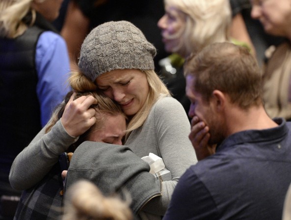 Mourners cry and comfort each other during a vigil for the victims of the mass shooting at the Thousand Oaks Civic Arts Plaza on November 8 Thousand Oaks shooting