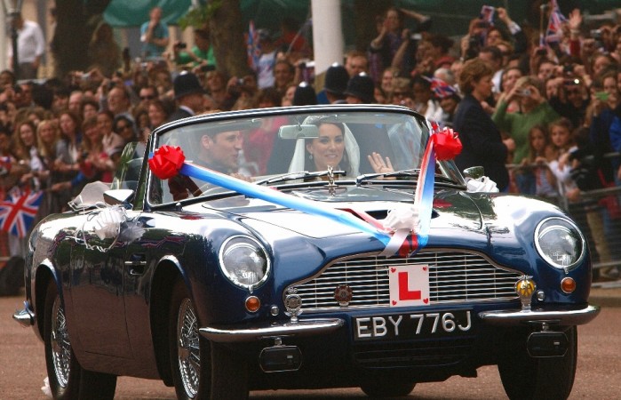Britain's Prince William drives his wife, Kate, Duchess of Cambridge in his father Prince Charles' Aston Martin Volante Prince William, Aston Martin, British Royal Family