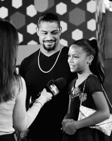 Roman Reigns (L) with his daughter Joelle Anoa'i (R) at an event in Santa Monica on July 19, 2018 Roman Reigns