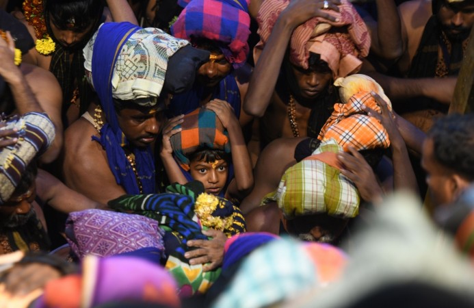 Devotees on their way to Sabarimala sabarimala pilgrimage