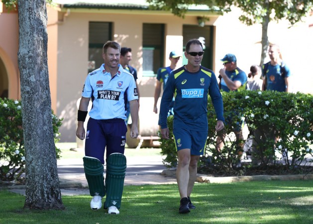 Warner with coach Justin Langer at SCG. David Warner