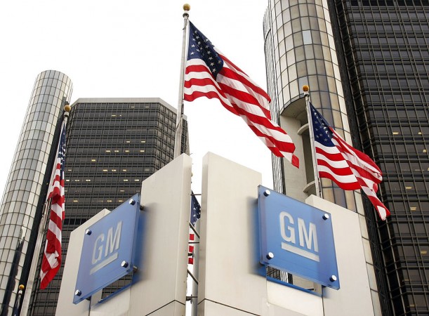 Signs stand in front of the General Motors world headquarters complex November 18, 2010 in Detroit, Michigan General Motors, USA