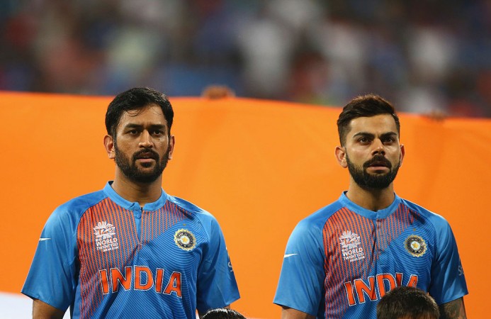 Dhoni and Kohli singing the national anthem during the World T20 in 2016 Kohli and Dhoni