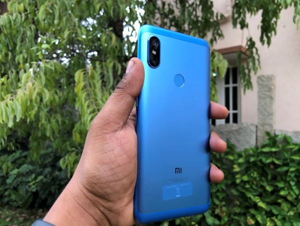 Xiaomi Redmi Note 6 Pro flaunts metallic shell on the back with P2i water-repellent coating. Xiaomi, Redmi Note 6 Pro, review, India, launch, price, specs