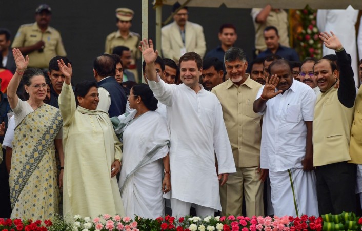 This picture taken on May 23, 2018, shows (R-L) United Progressive Alliance (UPA) chairperson Sonia Gandhi, Majority People's Party supremo Mayawati, West Bengal Chief Minister Mamta Banerjee, Indian Congress party president Rahul Gandhi, Chief minister of India's Andra Pradesh state Chandrababu Naidu and JDS leader HD Kumaraswamy, participating at the swearing-in ceremony in Bangalore. grand alliance opposition