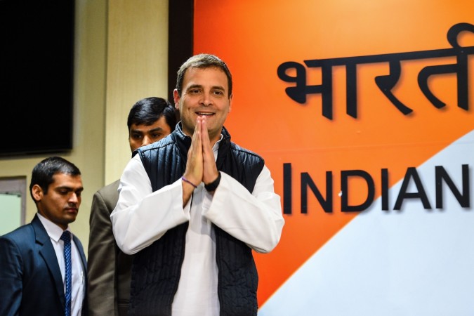 President of the Indian National Congress Party Rahul Gandhi greets as he arrives for a press conference at the All India Congress Committee offices in New Delhi on December 11, 2018. - India's ruling party looked set to lose power in at least one of three traditional stronghold states releasing election results on December 11, in a blow to Prime Minister Narendra Modi ahead of national polls in 2019. President of the Indian National Congress Party Rahul Gandhi