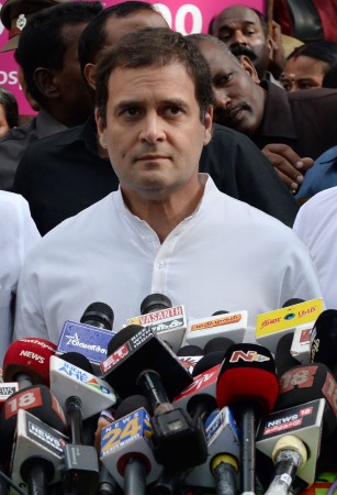 Indian National Congress party President Rahul Gandhi addresses the media after visiting at the hospital Dravida Munnetra Kazhagam (DMK) party President M.Karunanidhi, in Chennai on July 31, 2018. - Thousands of followers of an Indian politician held in almost god-like reverence thronged the streets on Tuesday outside the hospital where the 94-year-old was in intensive care. (Photo by ARUN SANKAR / AFP) Indian National Congress party President Rahul Gandhi