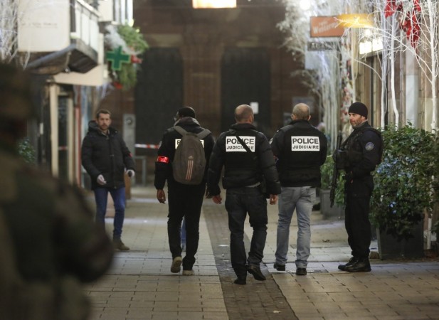 STRASBOURG (FRANCE), Dec. 11, 2018 (Xinhua) -- Police investigate near the scene of a shooting in the center of Strasbourg, France, on Dec. 11, 2018. At least two people were killed and eleven wounded in a shooting near a Christmas market in the French city of Strasbourg on Tuesday evening, local media reported. (Xinhua/Ye Pingfan/IANS) Police investigate near the scene of a shooting in the center of Strasbourg, France, on Dec. 11, 2018.