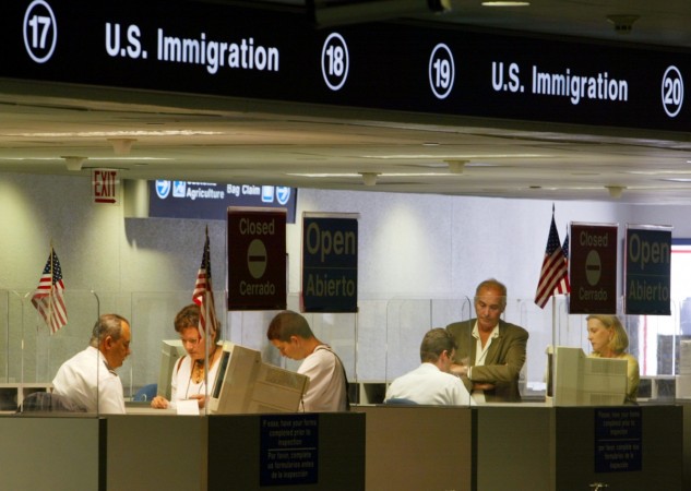 U.S. Immigration inspectors check passports US immigration