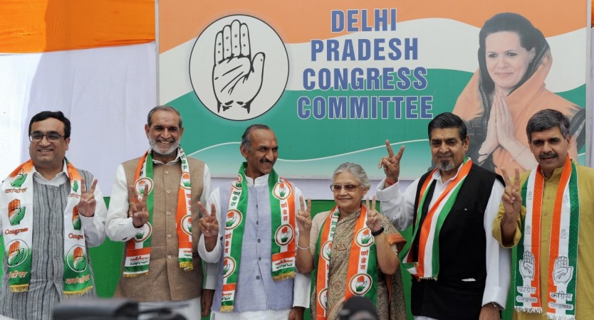 Delhi state Chief Minister Shiela Dikshit (3rd R) and Delhi Pradesh Congress Committee (DPCC) President J. P. Agarwal (3rd L) poses with Congress candidate Ajay Makan (L) from New Delhi parliament seat, Sajjan Kumar (2nd L) from the South Delhi parliament seat, Jagdish Tytler (2nd R) North East Delhi's parliament seat and Sandeep Dikshit (R) from East Delhi parliament seat, during a media event in New Delhi on April 1, 2009. AFP PHOTO/Prakash SINGH sajjan kumar