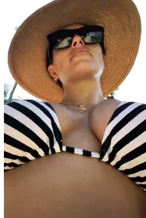 Ashley Graham flaunts her assets in gorgeous swimsuits 