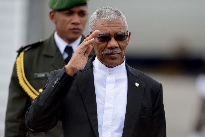 Guyana's President David Arthur Granger waves as he arrives at Punta Cana airport on January 24, 2017, to attend the fifth summit of the Community of Latin American and Caribbean States (CELAC), held at the Barcelo Bavaro Convention Center in Bavaro, Dominican Republic. david granger