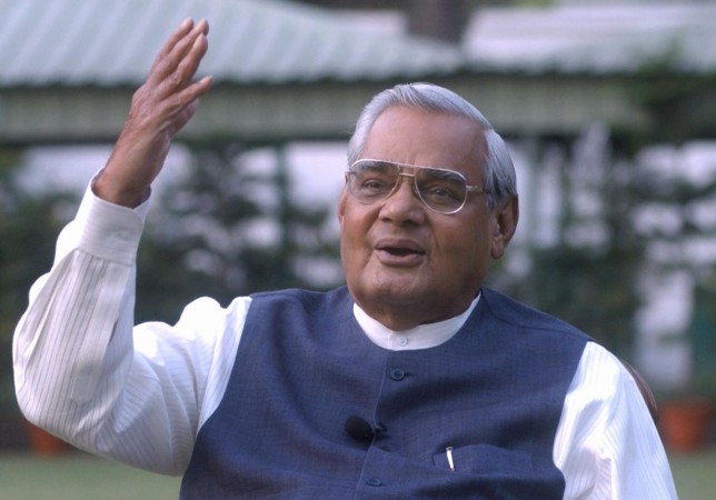 Atal Behari Vajpayee gestures as he poses for photographers at his residence in New Delhi, 25 March 2004. AFP PHOTO/ RAVEENDRAN Atal Behari Vajpayee