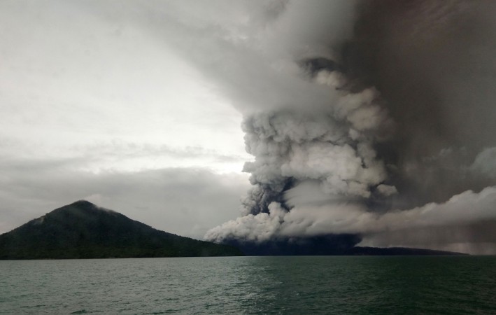 This picture taken on December 26, 2018 shows the Anak (Child) Krakatoa volcano erupting, as seen from a ship on the Sunda Straits Indonesia volcano